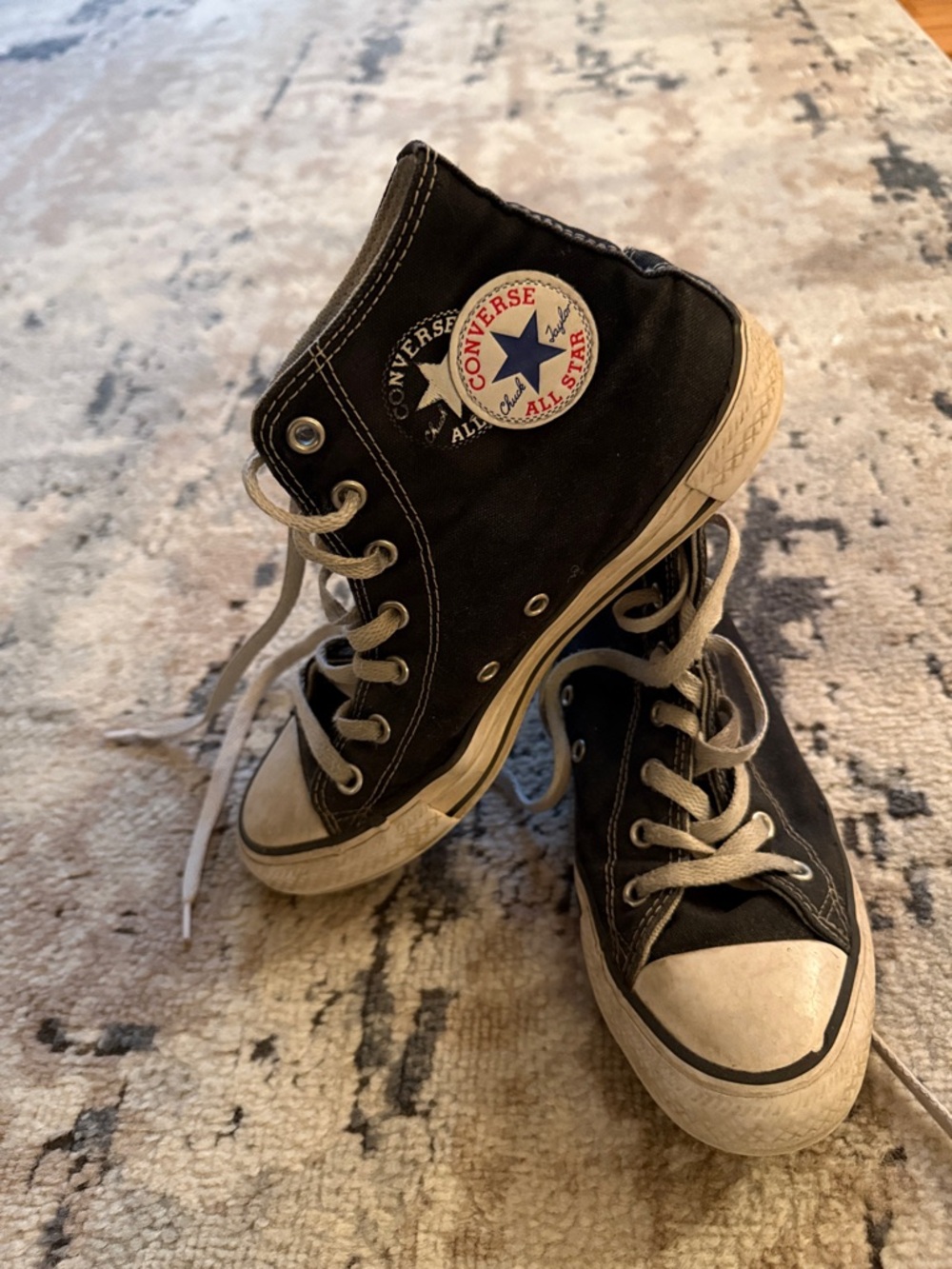 Kids size 5 Converse Black and White High-Top Chuck Taylor Sneakers